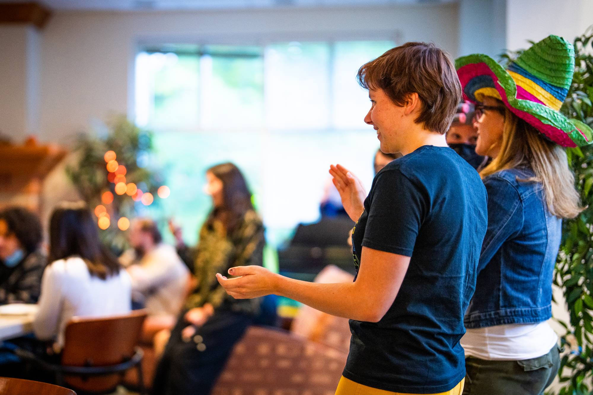 Students and a faculty member enjoying karaoke entertainment